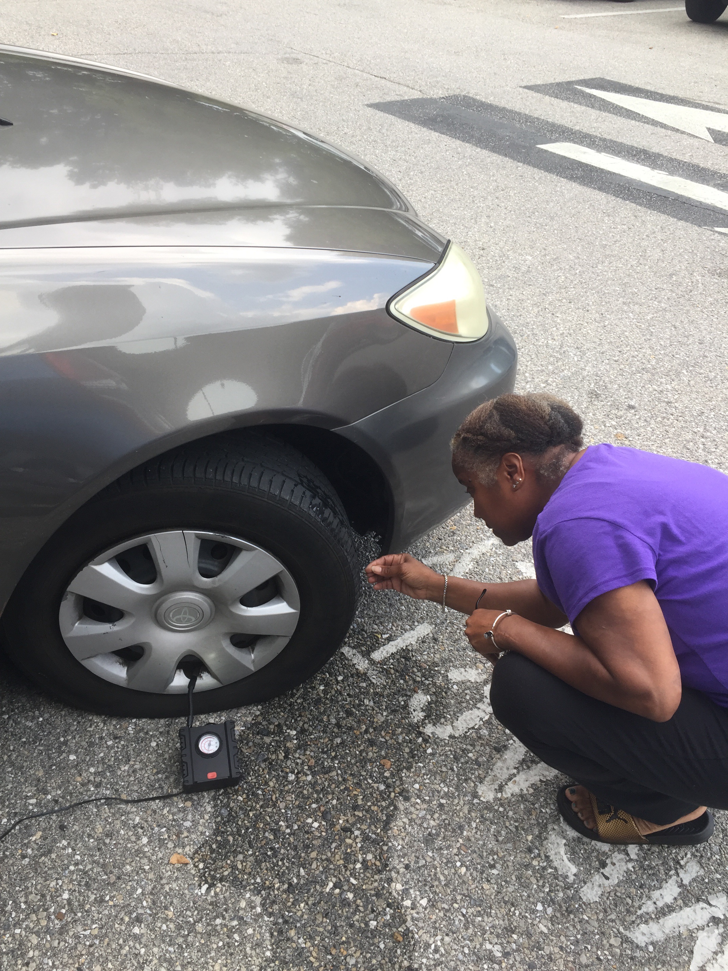 Looking at flat tire