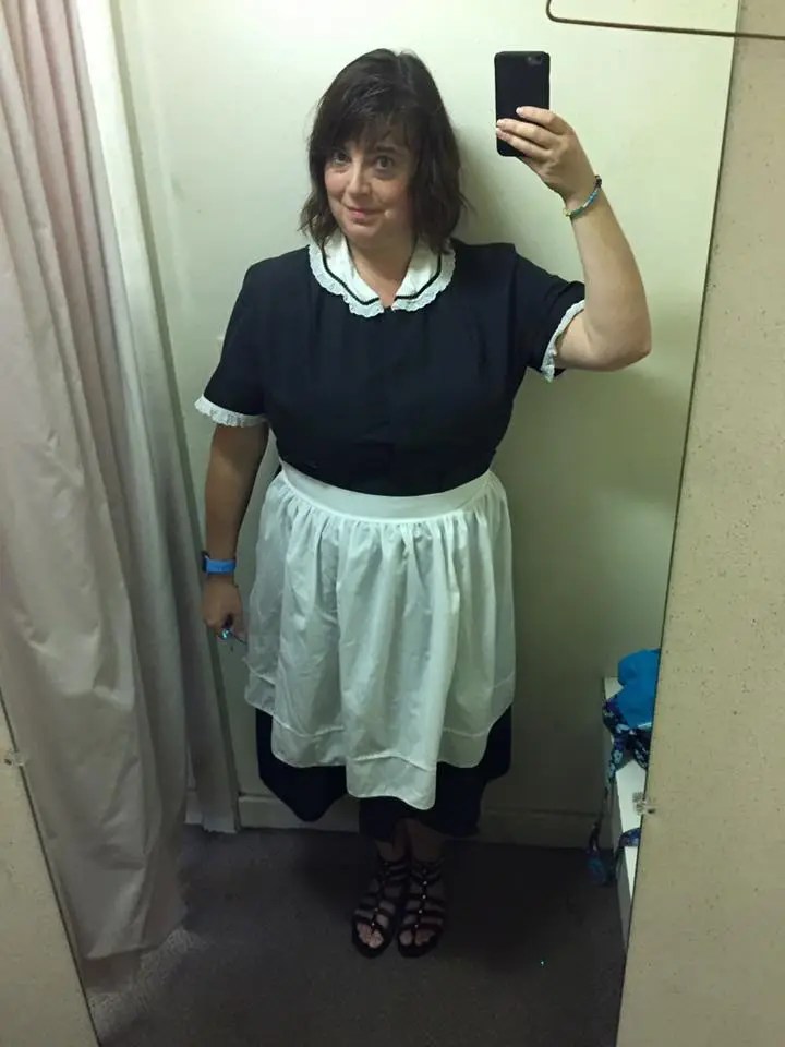 in a maid's costume
